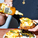 Yellowbird Organic Habanero Hot Sauce drizzled onto fluffy scrambled egg toast